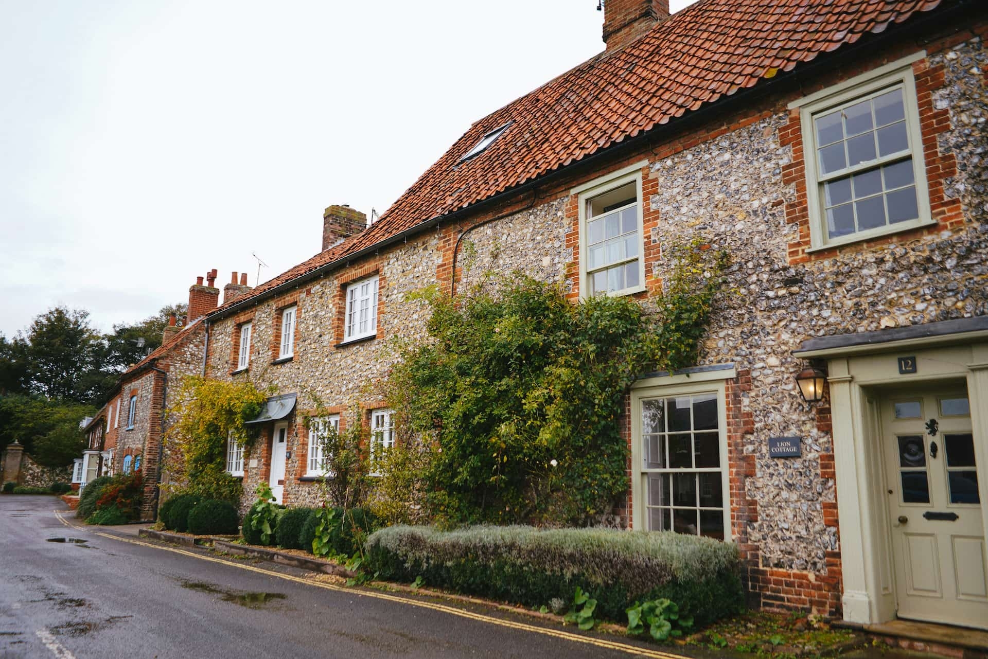 Traditional UK houses with brick and stone facades